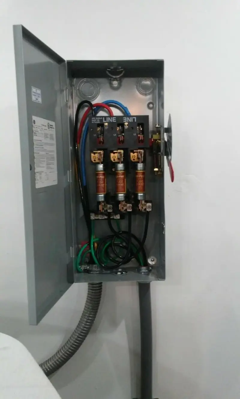 Three-phase disconnect switch installed for Smoke Detector Installation in Helena Valley West Central