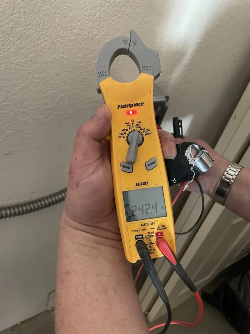 Voltage testing with clamp meter during Electrical Installation Services in Helena Valley West Central